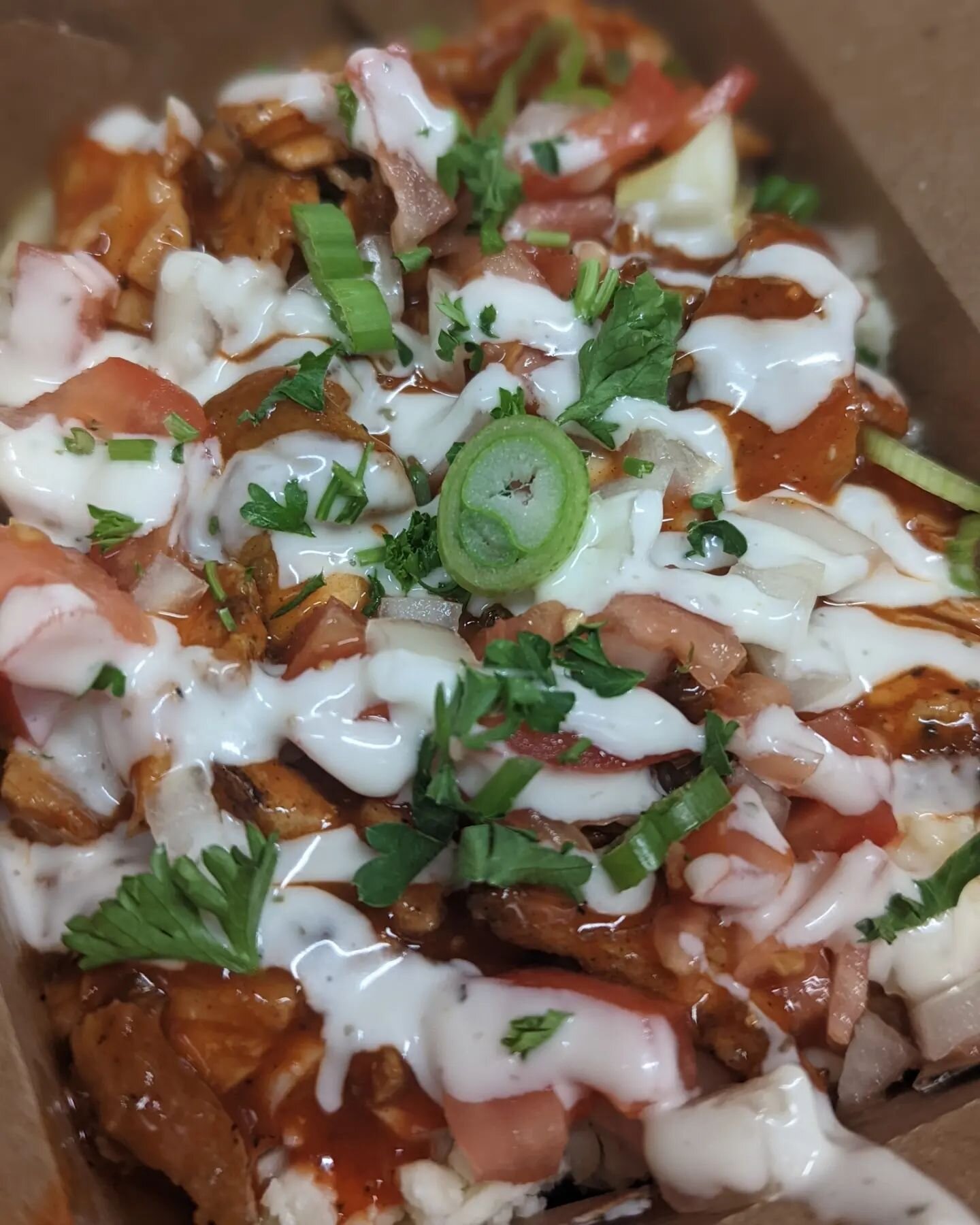 We got a buffalo chicken �?� poutine in the first pic. Hot fire. 
And a brand new poutine moving through R &amp; D in the second picture. That's falafel crumble, pickled red onions, tzatziki and parsley. As always, you can snag it with our homemade v