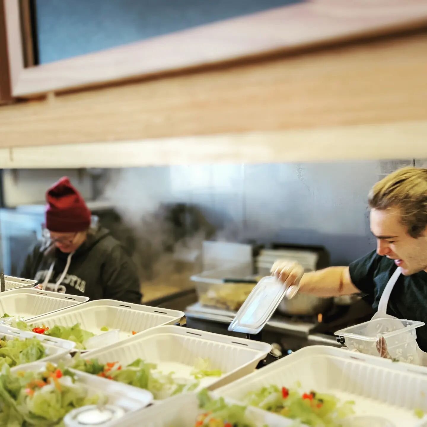 Action shot of Chris and Abbie crushing it this morning and more importantly, having super fun times while doing it. 
Prepping fries. 
Portioning salads. 
Making memories.